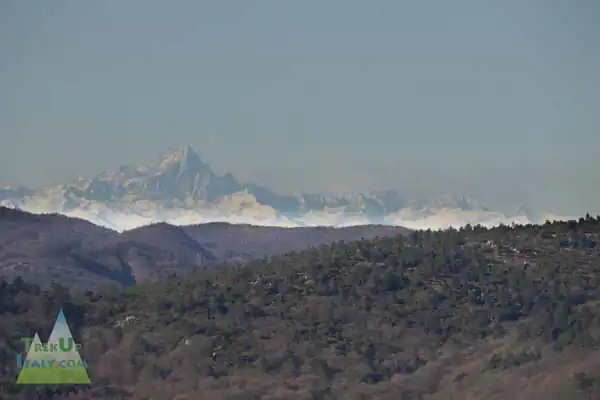 The Monviso mountain appears from the hills of Beigua Natural Park